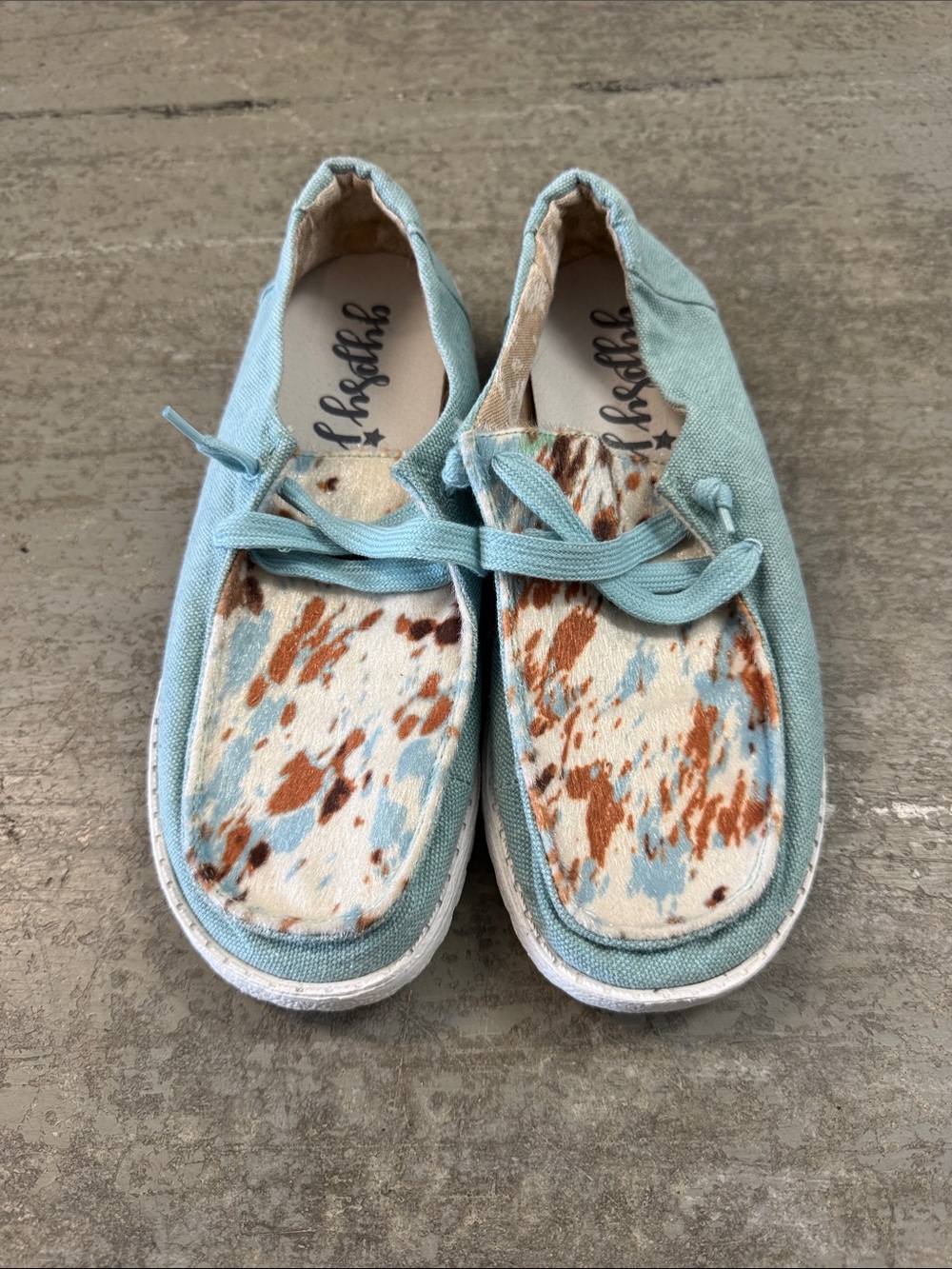 Gypsy Jazz Mooma turquoise and brown cow print pattern slip-on sneaker